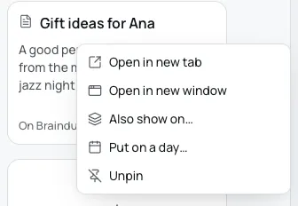 The Note options menu open on a pinned note's card: Open in new tab, Open in new window, Also show on, Put on a day and Unpin.