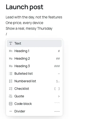 The slash menu open in a note, listing Text, three headings, three lists, Quote, Code block and Divider, each with its Markdown on the right.